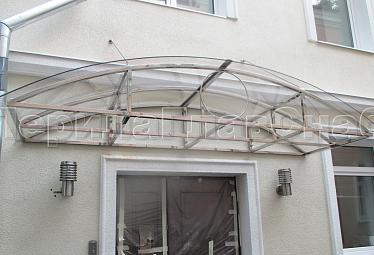 Козырьки на металлокаркасе купить в Москве